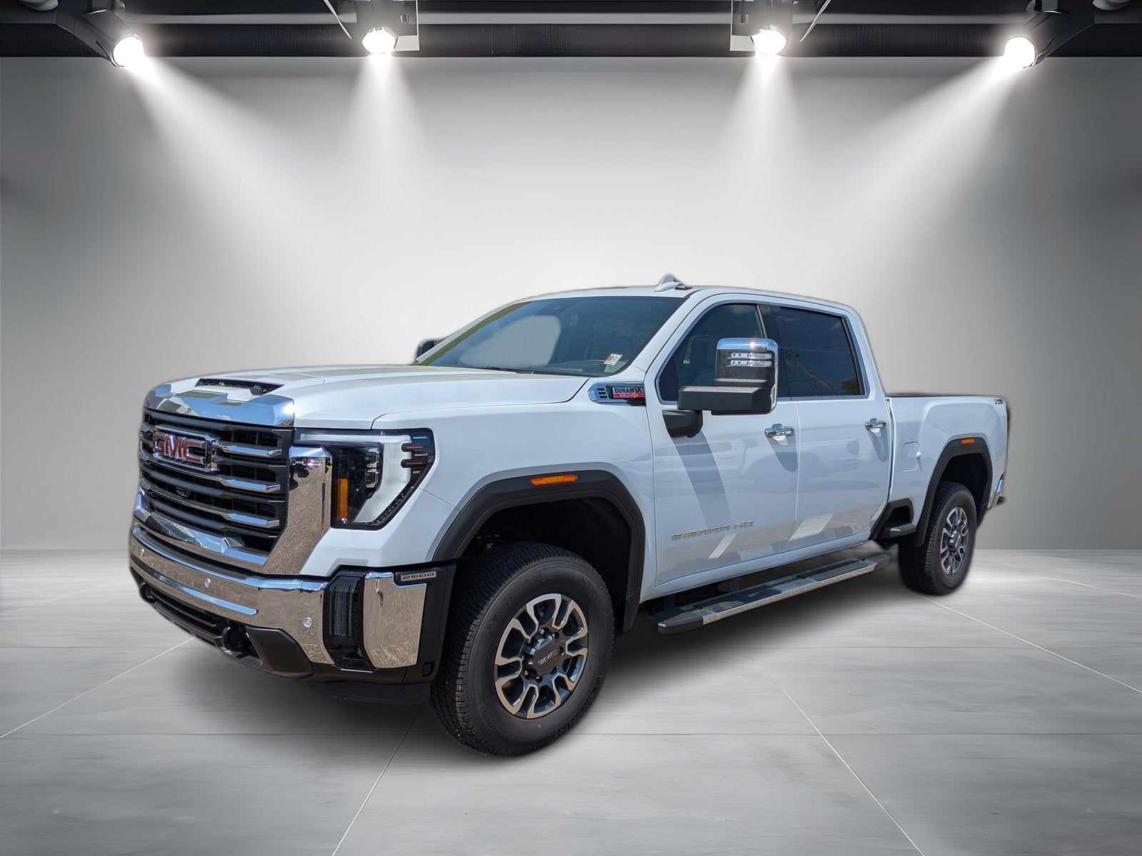 2026 GMC Sierra 2500 HD SLT in Glacier White Tricoat — front three-quarter view
