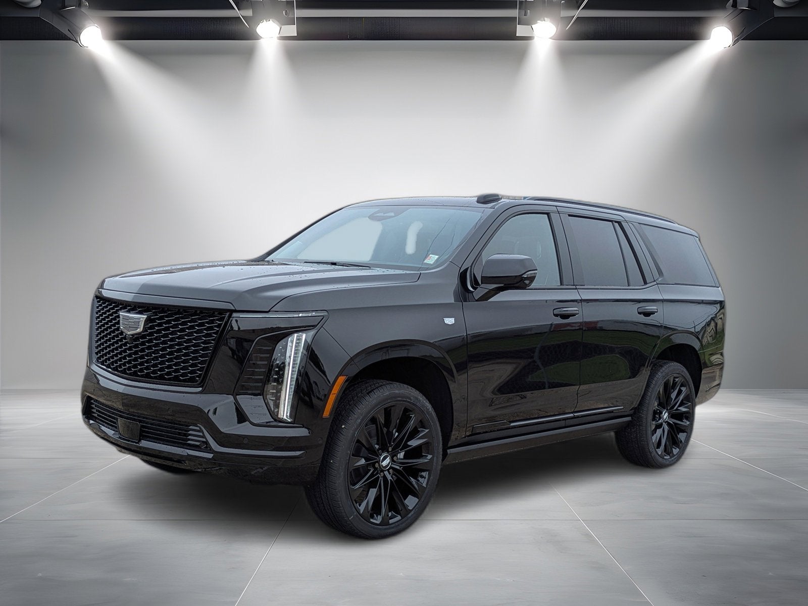 2026 Cadillac Escalade Platinum Sport in Black Raven — front three-quarter view