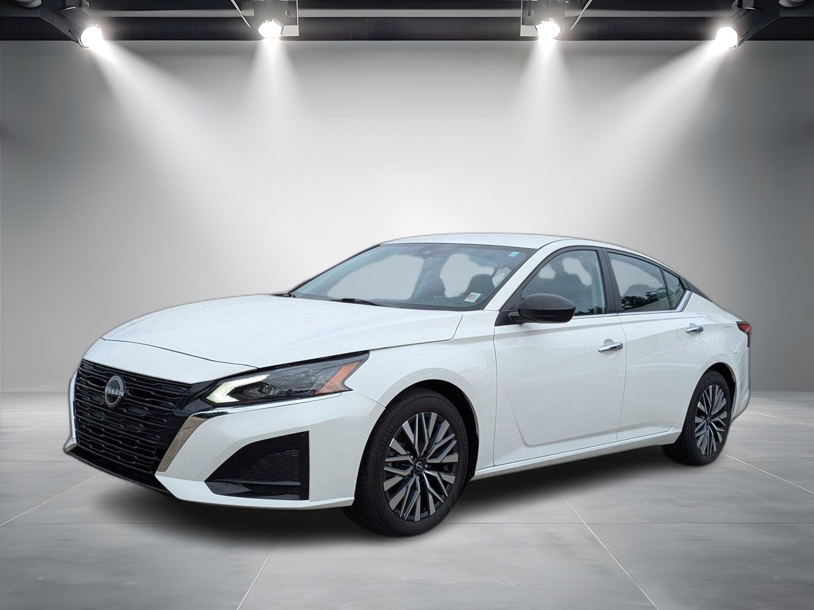 2025 Nissan Altima SV FWD in White — front three-quarter view